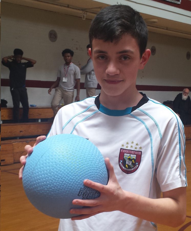UDI+Fabian+Rojas+holding+the+ball+he+used+to+shoot+a+game+changing+three-pointer.