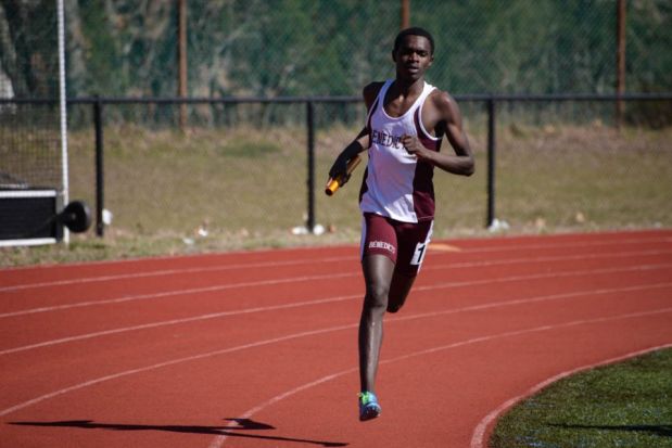 Freshman Ronald Kigen runs the 1600-meter leg in the Distance Medley Relay.
