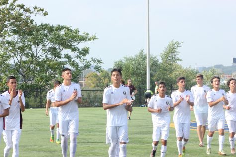 UDII Felipe Lucas and his teammates celebrating with the crowd, after the win.