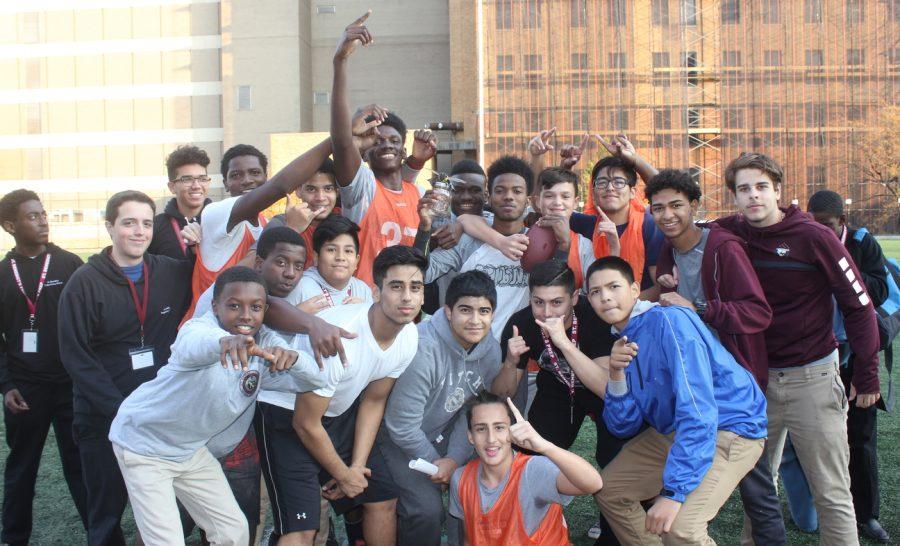 Father Philip Hoover's group members celebrating after obtaining the Group Game Championship in football.