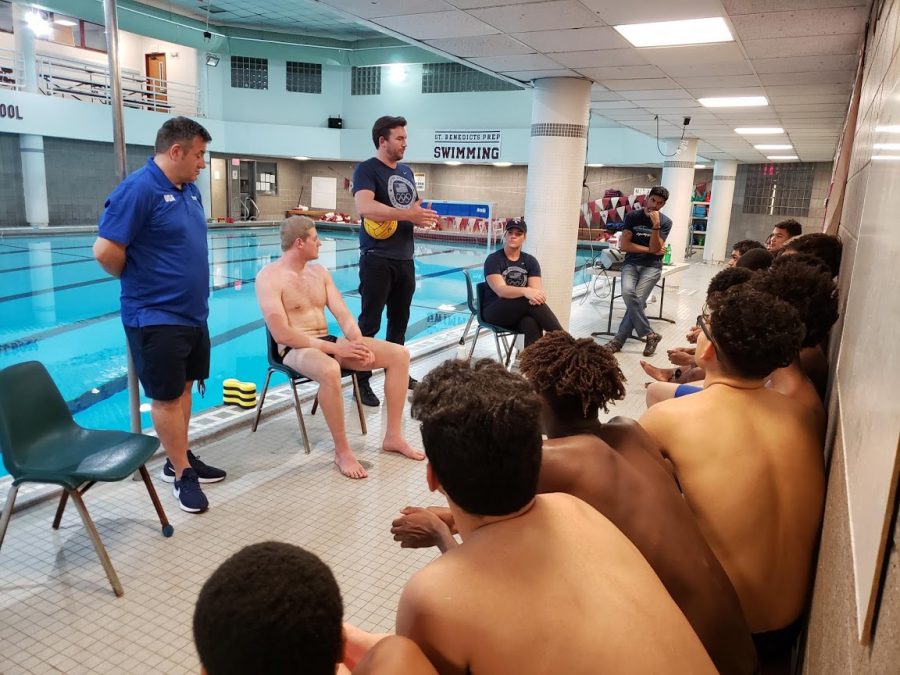 SBP%27s+Water+Polo+Team+is+treated+to+some+Olympian+expertise+during+a+training+clinic.+%28From+left%29+Olympics+Coach+Dejan+Udovicic+and+U.S.+Water+Polo+Olympians+Thomas+Dunstan%2C+John+Mann%2C+and+Kami+Craig+talk+technique+and+winning+attitude+to+the+Gray+Bees.