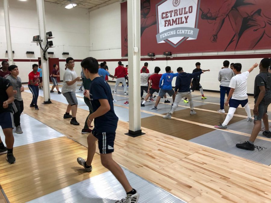 St.+Benedict%27s+Varsity+Fencing+Team+practices+footwork++in+the+new+Cetrulo+Family+Fencing+Center+to+strengthen+offensive+and+defensive+moves.