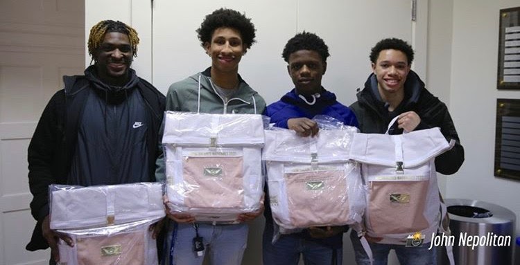 Some Track members get ready for Nationals (from left): Team Captain Malachi Little, Saveyon Blake, Iyad Boxton, and Josue Reyes.